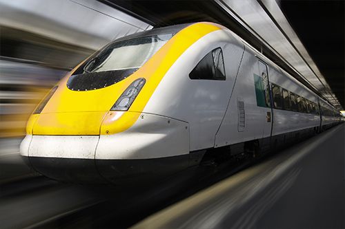 Picture of a yellow high speed train