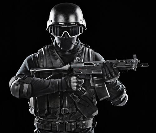 Picture of an commando soldier in black representing the defense industry